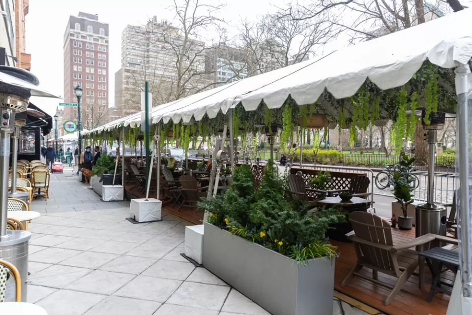 Covered outdoor dining patio on street in Philadelphia, Pennsylvania